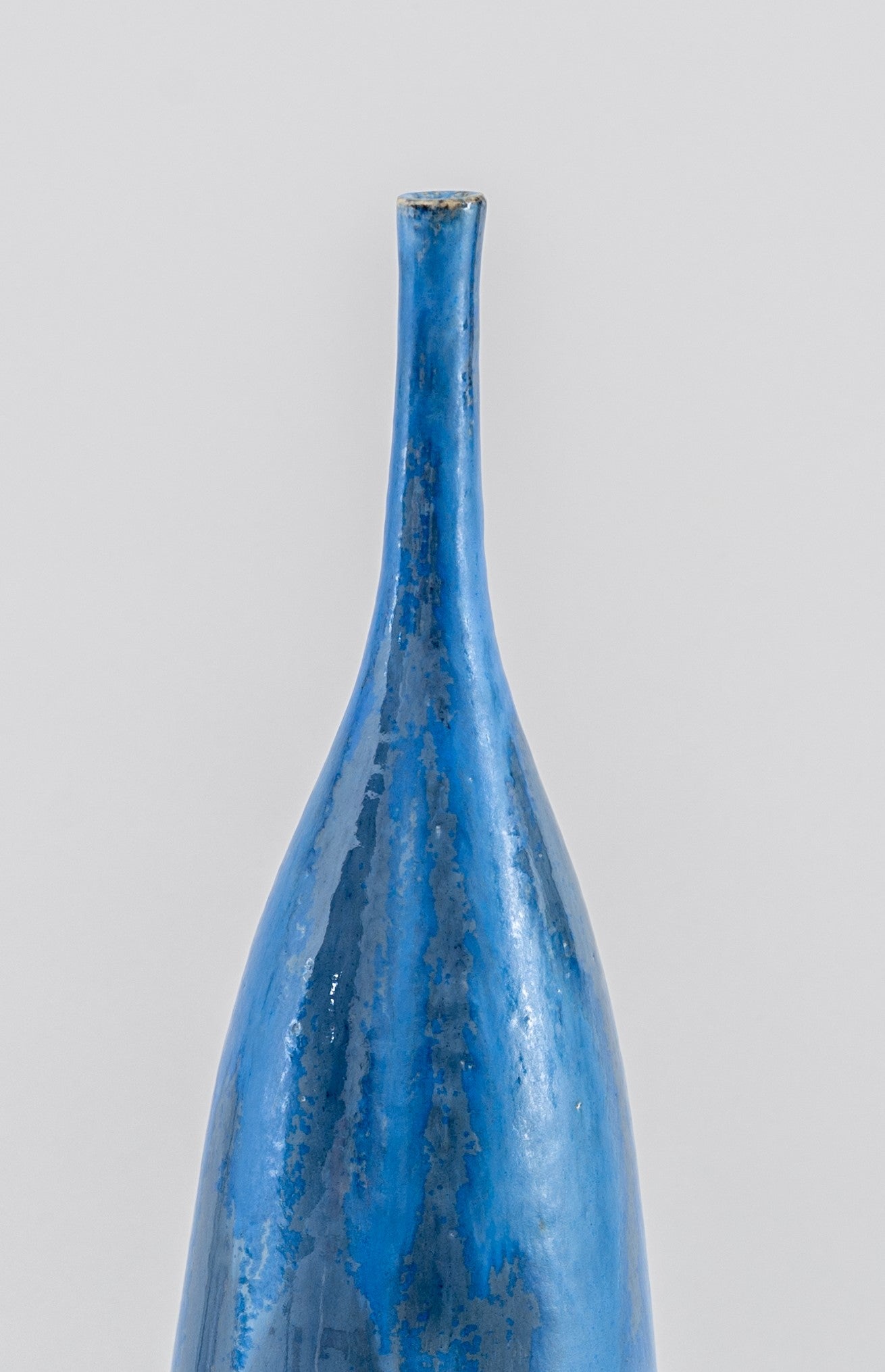 Tall Thin Blue Ceramic Bottle