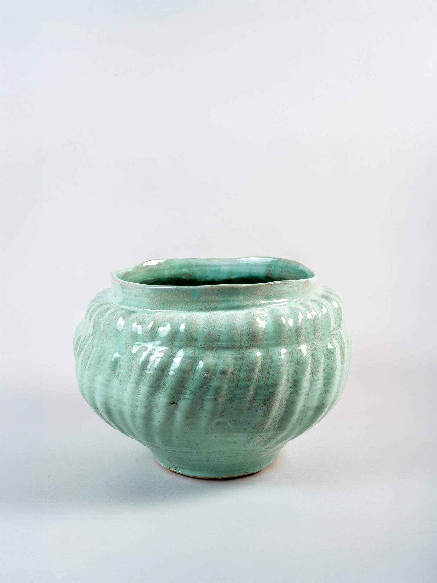 Decorative Turquoise vessel by Jacaranda Kori